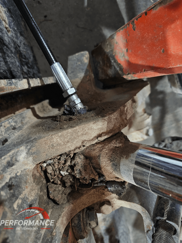 Kubota lower bushing pins getting greased with AMSOIL NLGI#2 Synthetic Polymeric EP